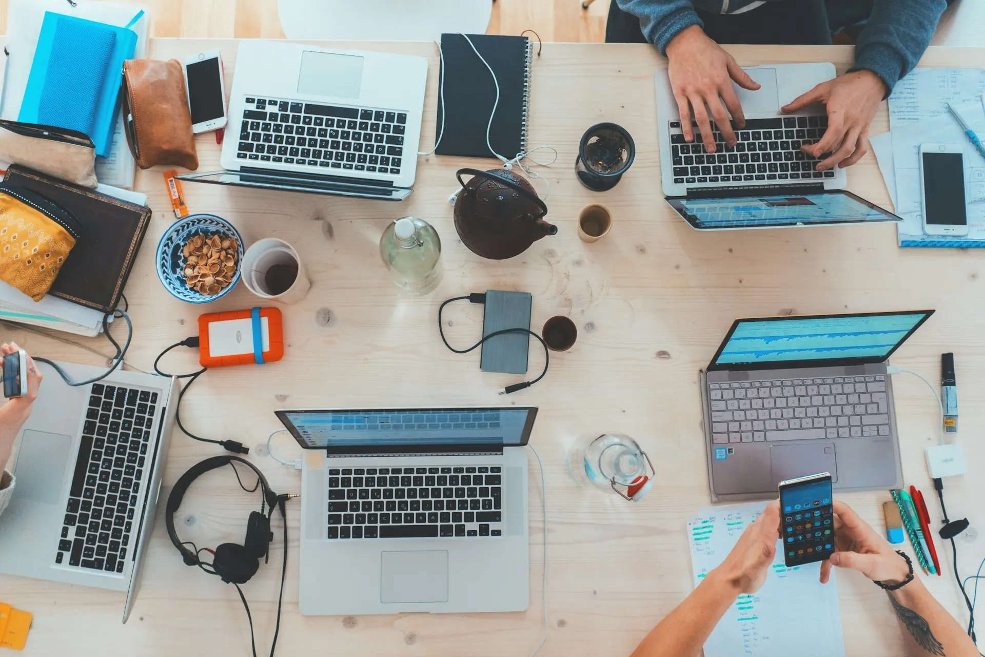People sharing ideas and working together around a table
